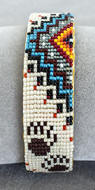 a2968 Ivory/multi bear tracks/rainbow beaded bracelet