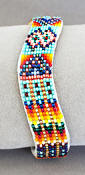a3206 Cut bead curved bracelet in a rainbow of colors