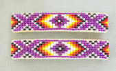 a3309 Pair clear magenta/flame eagle feather barrettes
