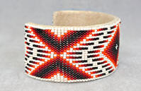 a3441 Tan/flame diamond pattern wide cuff bead bracelet, side view