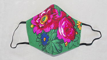 a3706 Open view of green/multi 2-layer floral face mask